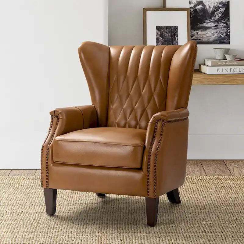 Poltrona Xaver in vera pelle tradizionale con gambe in legno massello