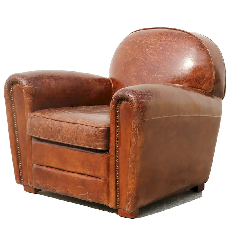 Poltrona Club in vera pelle marrone con borchie e struttura in legno