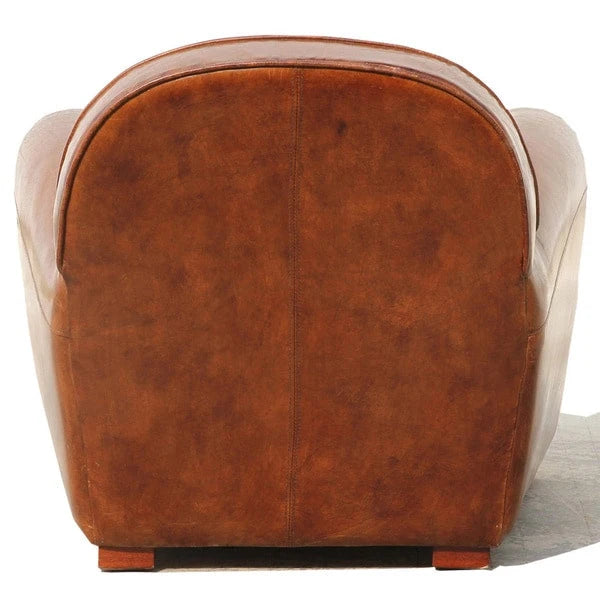 Poltrona Club in vera pelle marrone con borchie e struttura in legno