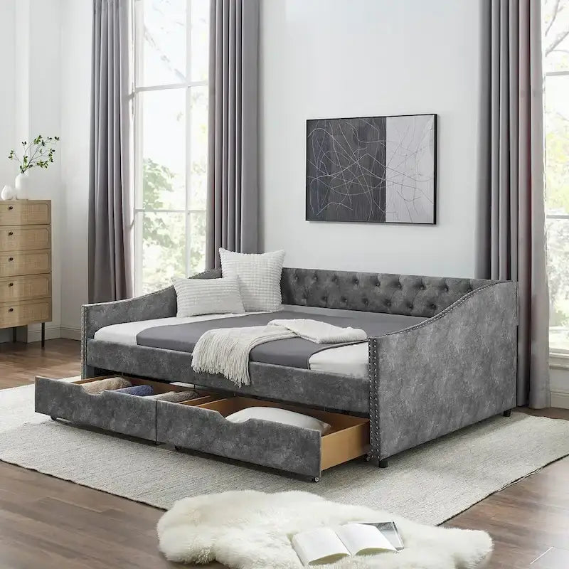 Divano letto imbottito in tufting a grandezza naturale con cassetti
