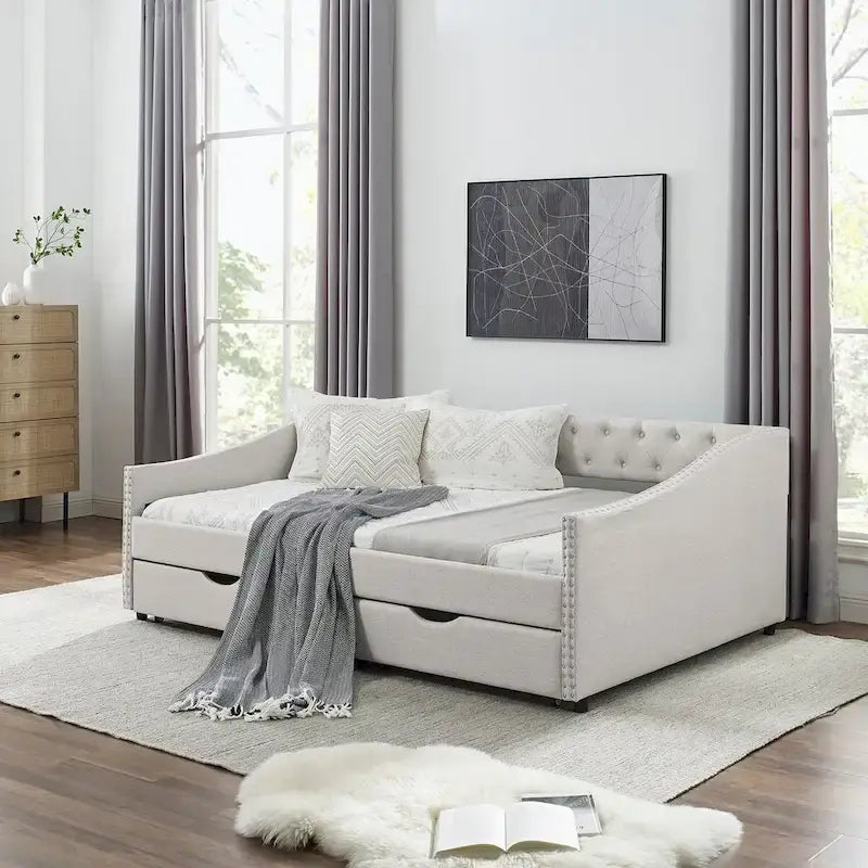 Divano letto imbottito in tufting a grandezza naturale con cassetti